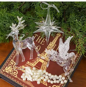 Set of clear acrylic Christmas tree ornaments featuring reindeer, star, and pegasus.
