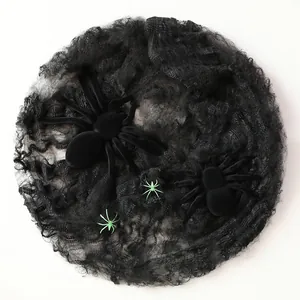 Realistic black plush spider and web prop for Halloween outdoor haunted house decor