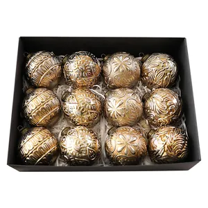 Set of 12 vintage 8cm gold and silver Christmas baubles with embossed patterns.