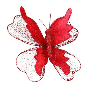 Vibrant red butterfly Christmas tree ornament with glitter sequins and mesh wings.