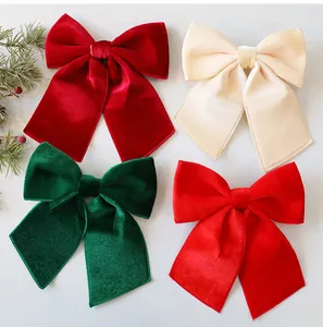 Assorted red, green, and cream velvet Christmas bows for holiday tree DIY decorations