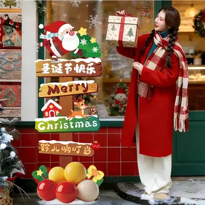 Detailed view of a festive Christmas KT board signpost with Santa and reindeer motifs.
