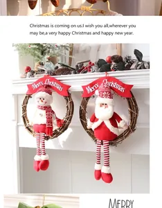 Detail view of Christmas vine wreath ornaments with Santa and snowman figures