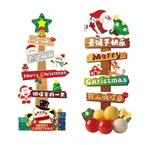 Detailed view of festive Christmas directional sign boards with Santa and snowman motifs.