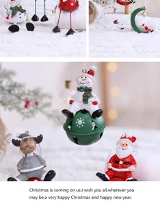 Detailed view of festive iron Santa Claus and Snowman ornaments for Christmas tree decoration