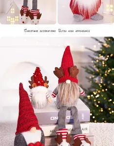 Handmade Christmas gnome ornaments featuring red knit hats and plush reindeer antlers