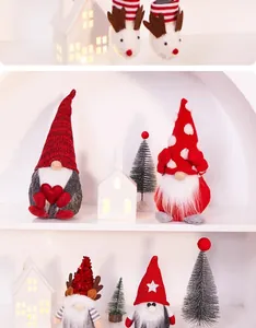 Detailed view of multiple handmade Christmas gnomes on a white shelf with cozy festive decor