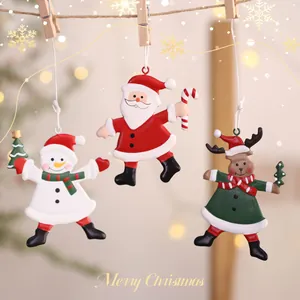 Festive set of three metal Christmas ornaments featuring Santa Claus Snowman and Reindeer