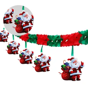 Festive red and green Christmas garland hanging with Santa Claus paper ornaments