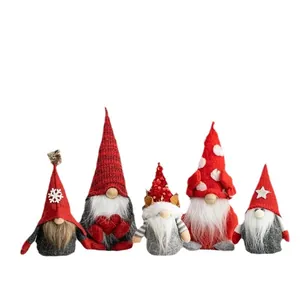 Decorative set of five red and grey Christmas gnome plush dolls for festive tabletop display