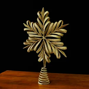 Gold glitter snowflake Christmas tree topper with spiral iron base for holiday decor