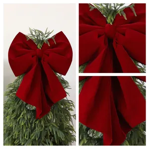 Elegant large burgundy velvet bow for Christmas tree topper decoration and festive ornament