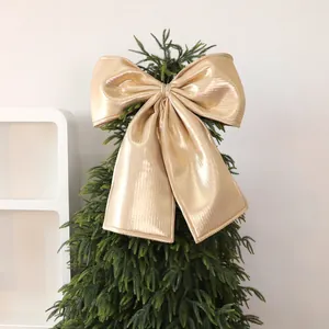 Large champagne gold metallic Christmas bow ornament for tree topper decoration