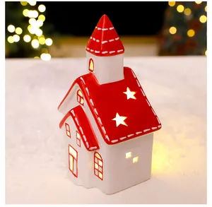Ceramic Christmas house figurine with warm LED glowing lights for festive holiday decor