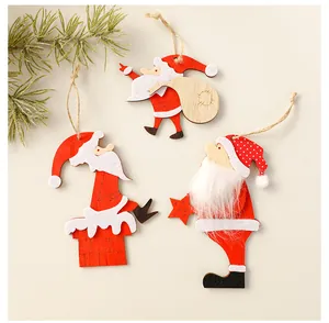 Detailed view of three assorted wooden Santa Claus Christmas tree hanging ornaments.