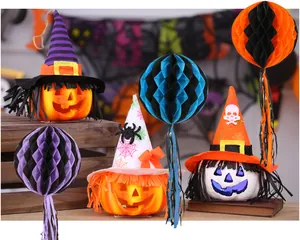 Detailed display of colorful Halloween honeycomb balls and festive pumpkin witch hat decorations