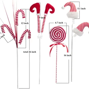 Red and white striped Christmas tree decorations featuring elf legs candy canes and lollipops