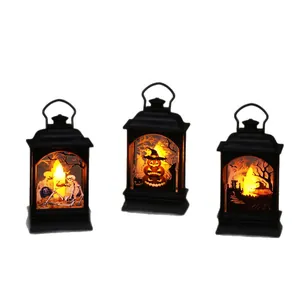 Three black Halloween LED lanterns featuring spooky pumpkin, skeleton and castle motifs.
