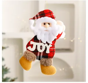 Plush Santa Claus hanging ornament with JOY lettering for Christmas tree decor.
