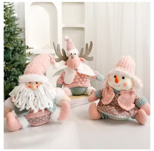 Set de tres peluches navideños en rosa y menta: Papá Noel, reno y muñeco de nieve