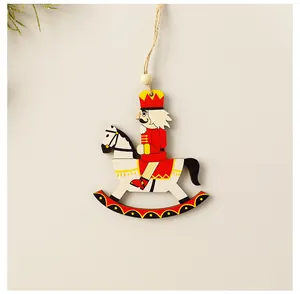 Detailed view of wooden nutcracker soldier on rocking horse Christmas ornament.