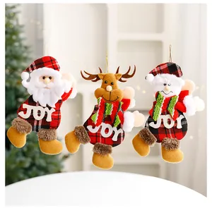 Detail of three plush Christmas tree ornaments featuring Santa, reindeer, and snowman