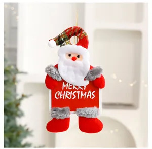 Cute Santa Claus plush hanging ornament with "Merry Christmas" sign for tree decor.