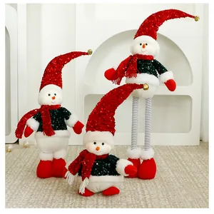 Detail view of three decorative Christmas snowman plush dolls featuring red sequined hats.