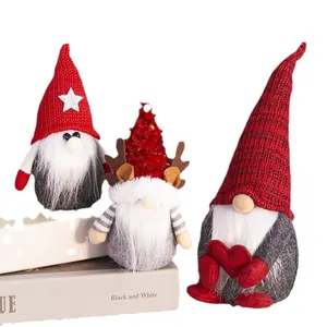 Set of three Christmas gnomes with red knit hats and white beards for holiday decor