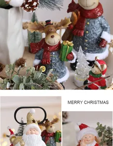 Vue macro détaillée de figurines festives de Noël en résine avec élan et Père Noël