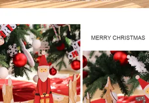 Handbemalte Weihnachtsdekoration aus Holz mit Weihnachtsmann- und Rentier-Motiven