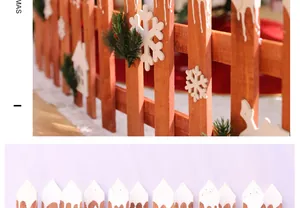 Detailansicht eines rustikalen hölzernen Weihnachtszau**ns** mit Schneeflocken und Schneespitzen