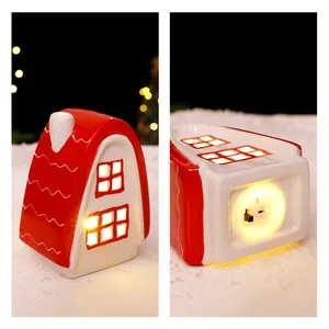 Nordic style red ceramic Christmas house ornament with a warm LED glow inside