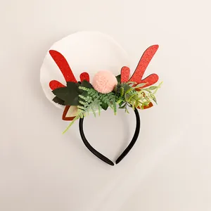 Serre-tête de Noël festif avec bois de renne, pompon et décoration de feuilles
