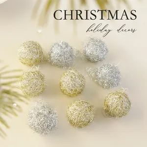 Sparkling set of gold and silver tinsel yarn balls for festive Christmas tree decoration