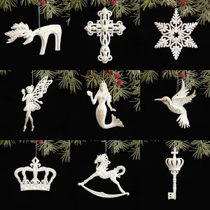 Set of 9 white vintage Christmas tree hanging ornaments in various festive shapes