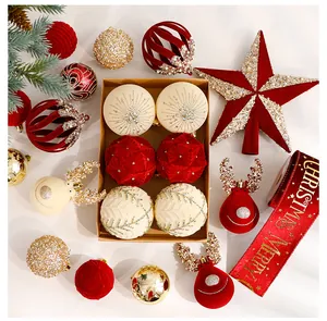 Detailed macro view of red and white flocked Christmas ornaments and gold glitter balls