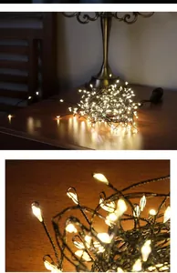 Macro view showing the detailed teardrop LED bulbs and twisted copper wire string lights.