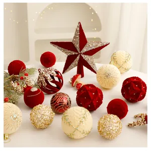Detailed view of festive red flocking balls and sparkling star topper for Christmas
