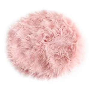 Soft pink long faux fur Christmas tree skirt with plush texture for holiday decor.