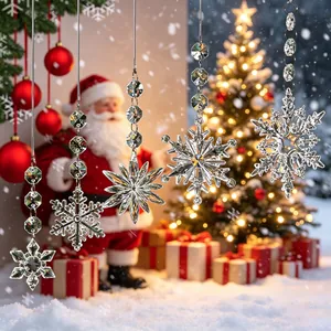 Clear acrylic snowflake and star pendants hanging for festive Christmas winter decorations