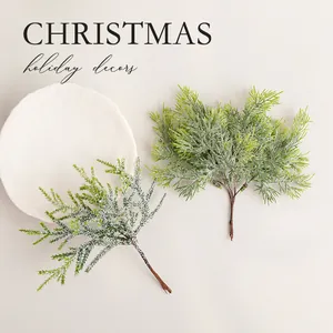 Artificial pine branches for DIY Christmas holiday decors and indoor arrangements