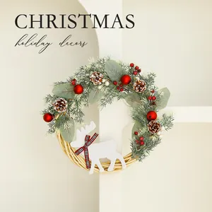 Elegant Christmas wreath with pine cones red berries and white reindeer for holiday decor