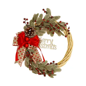 Decorative Christmas wreath with pinecone, red berries, and Merry Christmas sign