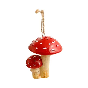 Handcrafted red and white spotted mushroom Christmas ornament with rustic twine rope