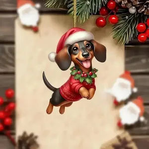 Primer plano de un adorno navideño de teckel con gorro de Papá Noel y suéter rojo