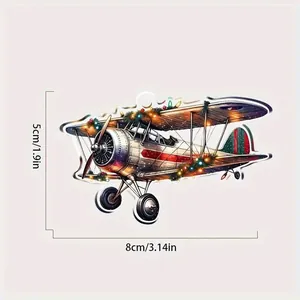 Detailed view of a vintage biplane Christmas ornament showing 8cm x 5cm size dimensions