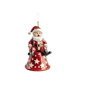 Décoration de Noël suspendue Père Noël assis sur une cloche rouge aux motifs d'étoiles