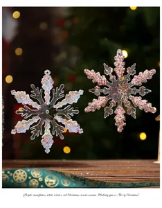 Detailed view of acrylic snowflake ornaments with glitter in a festive holiday setting