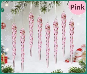 Set of pink acrylic spiral icicle ornaments hanging on a Christmas tree branch detail